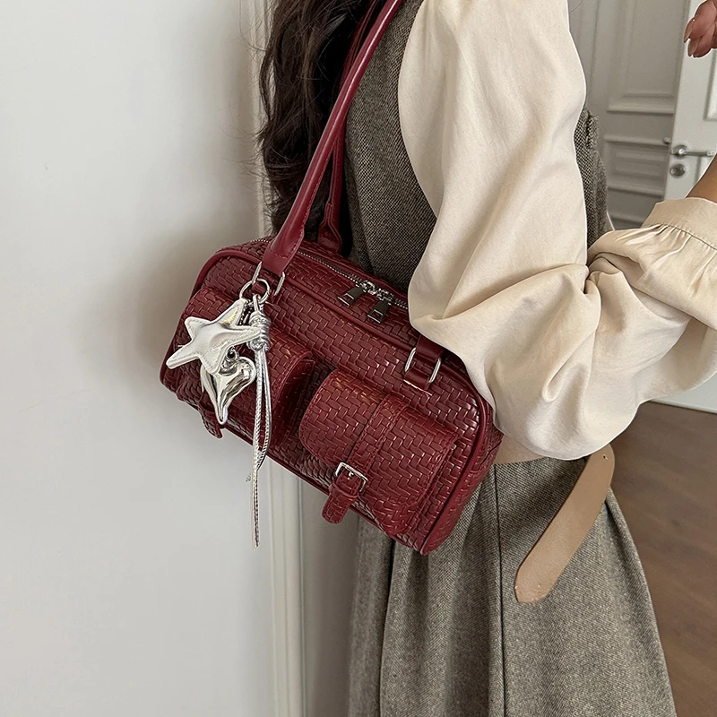 高级感编织单肩腋下保龄球包包女士2026新款简约百搭通勤法棍女包