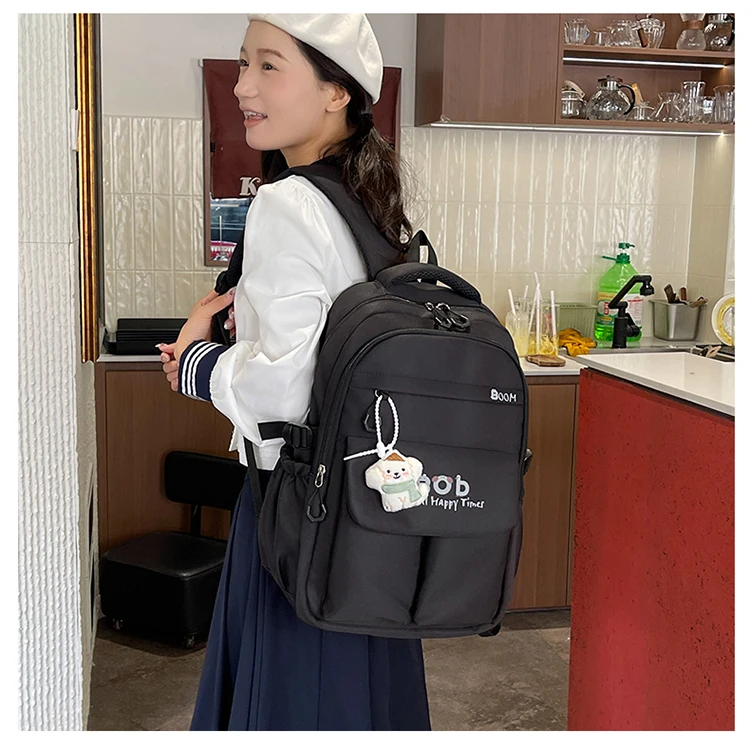 云雷9032女双兜带挂件双肩包28元