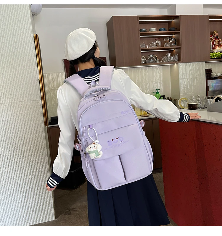 云雷2601女双兜带挂件双肩包29元