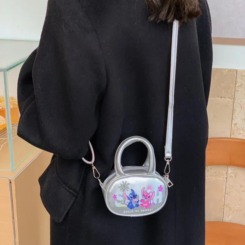 迪士尼手提包卡通单肩包可爱儿童小包迷你斜挎收纳包女孩口红包