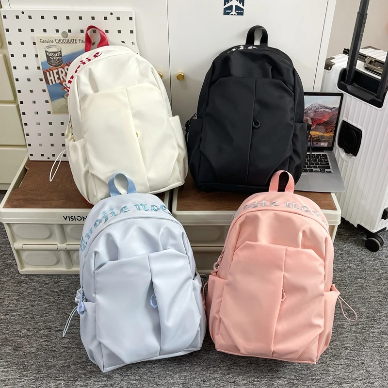 上口刺绣四色可选初高中学生书包大容量男女同款潮酷大学生双肩包户外出游书包